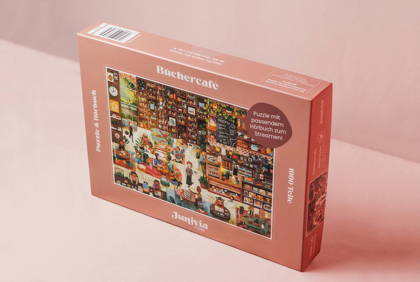 Junivia Büchercafe Puzzle: Schräge Gesamtansicht unseres Büchercafe Puzzle mit passendem Hörbuch mit Buchladenmotiv und Selbstfindungsgeschichte 

