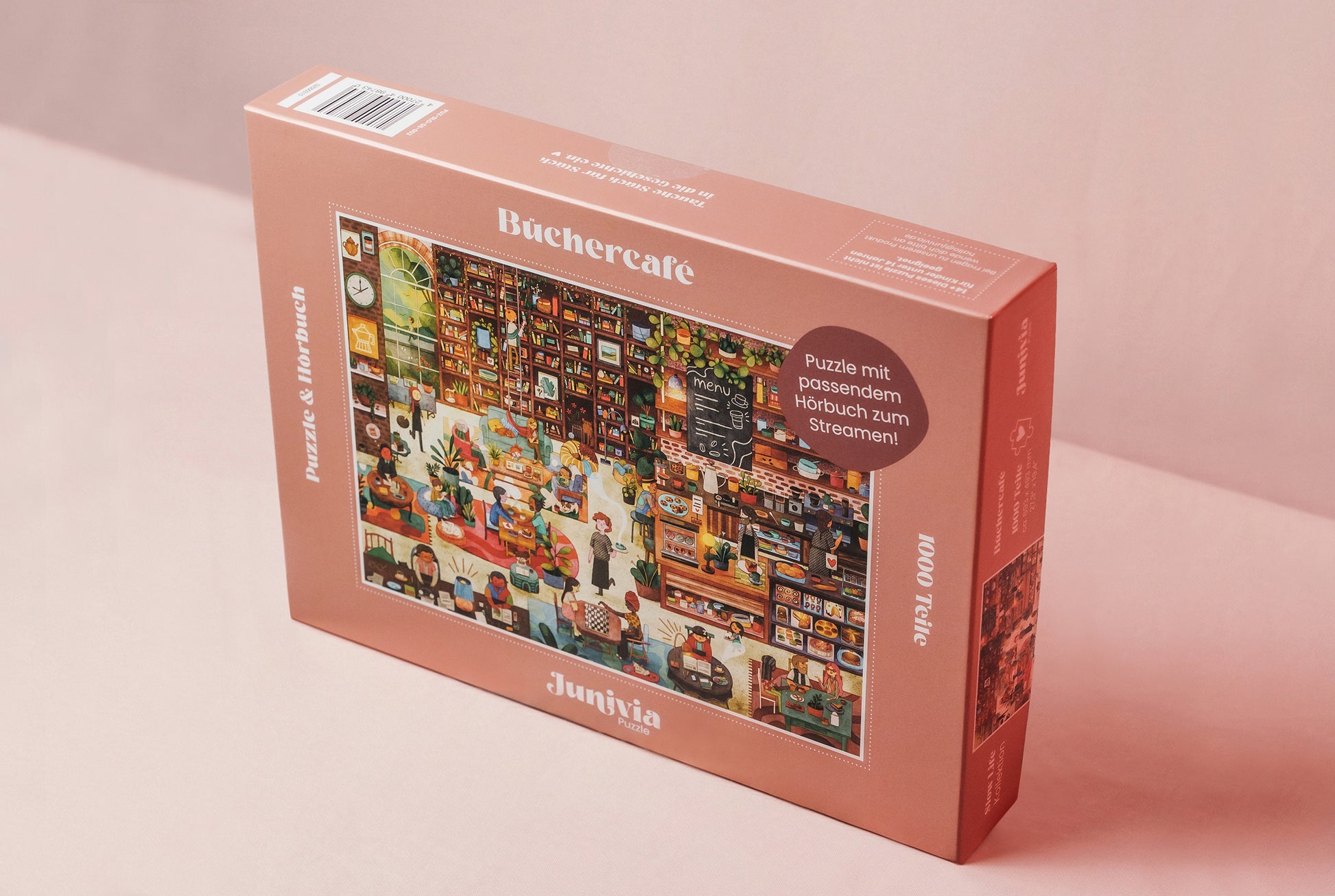 Junivia Büchercafe Puzzle: Schräge Gesamtansicht unseres Büchercafe Puzzle mit passendem Hörbuch mit Buchladenmotiv und Selbstfindungsgeschichte 
